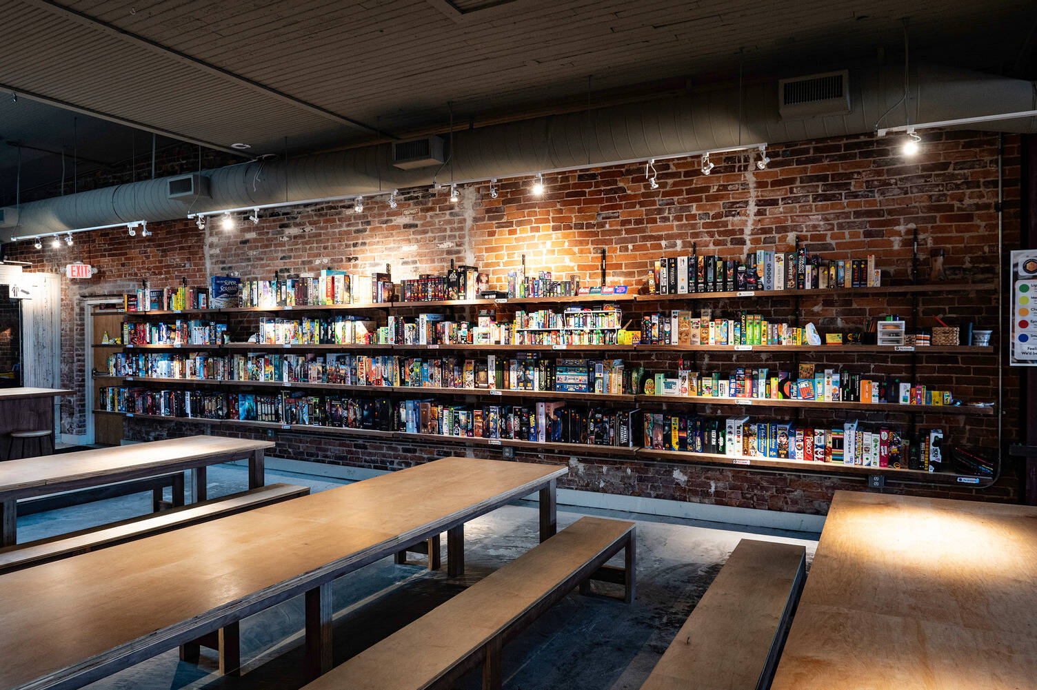 About | Caverns & Forests Board Game Café
